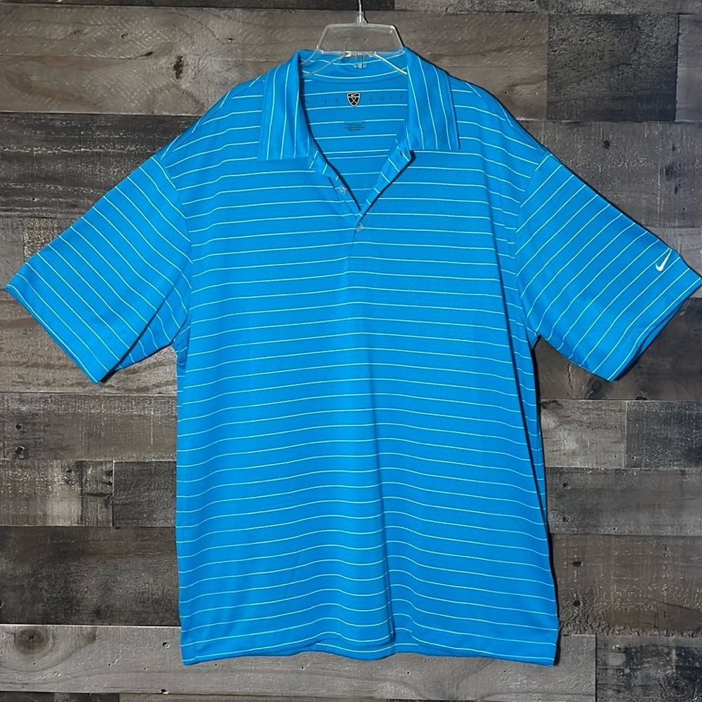 Nike large golf shirt like new‎ condition. It is a breathable fabric.